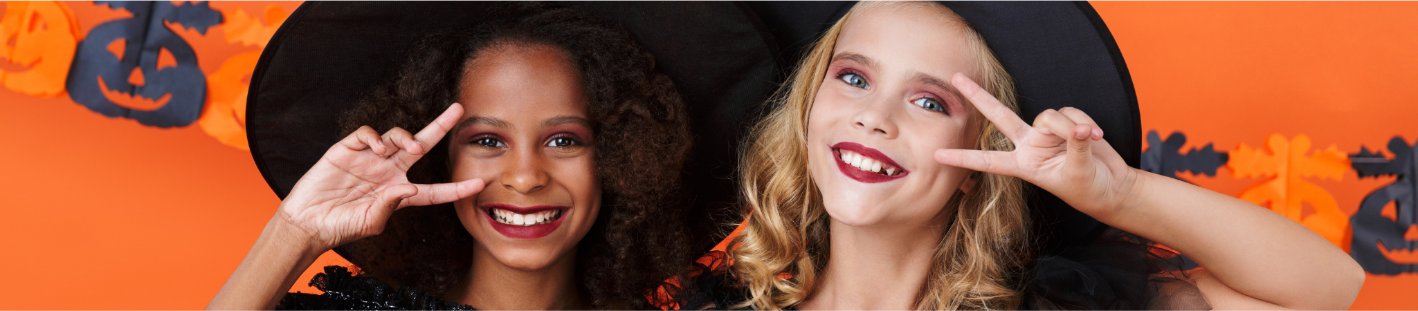 Two girls in witches hats